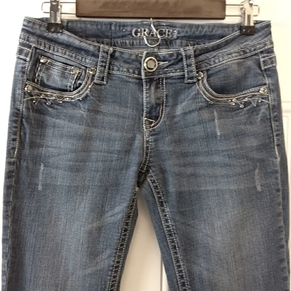 Grace in LA five pocket distressed bootcut jeans